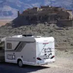Our motorhome parked above a historic kasbah along the road to Aït Ben Haddou in southern Morocco