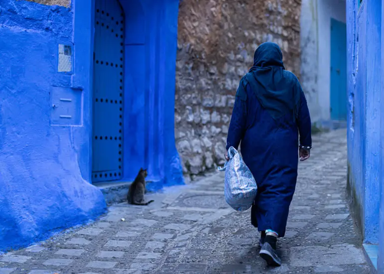 A local woman in the streets of Chefchaouen