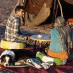 Leah, Hassan, and Oz at a nomad camp in M'Hamid